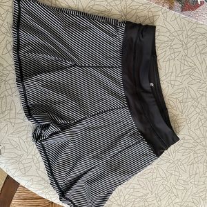 Navy & white stripe skort , Great for pickle ball or tennis ! Size small